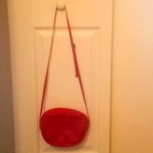 Red Leather pocket book real leather small cross over bag as well